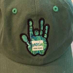Green Cap with Hand Design
